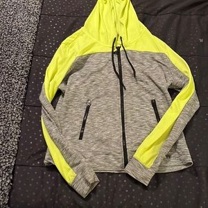 This lime green zip-up hoodie is perfect for anytime of the year.